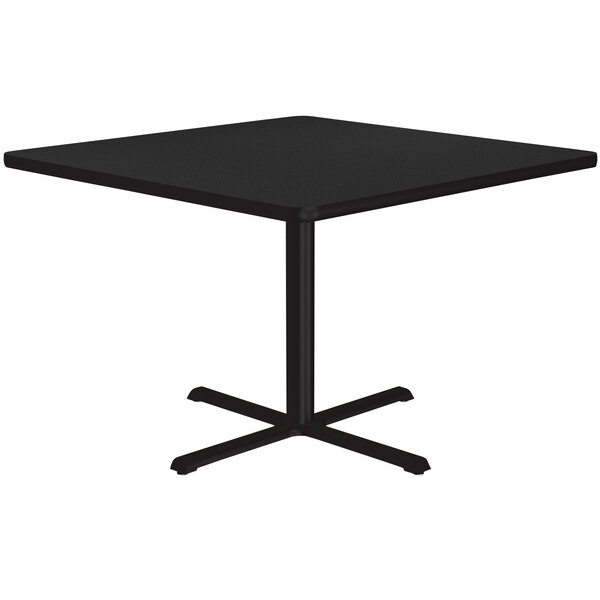 A Correll black square table with a metal base.