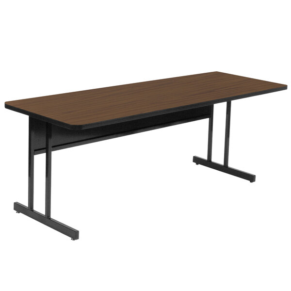 A brown rectangular Correll desk with black legs.