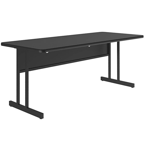 A black rectangular Correll desk with legs.