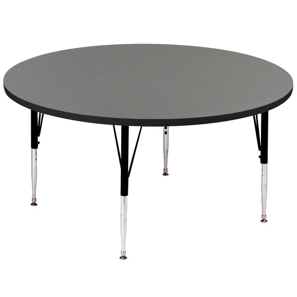 A Correll round activity table with a grey granite top and black legs.