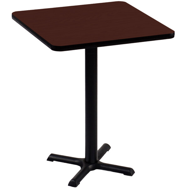 A Correll square bar height table with a brown top and black base.