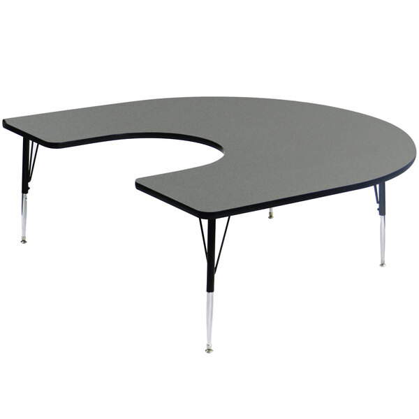 A grey Correll horseshoe-shaped activity table with adjustable height legs.