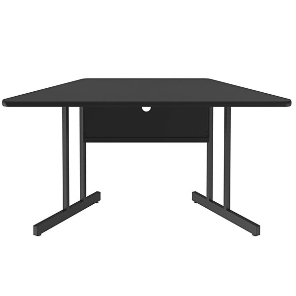 A Correll trapezoid desk with a black granite finish top and metal base.