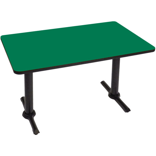 A green rectangular table with two black T bases.