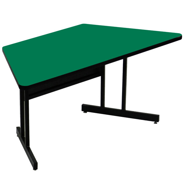 A green trapezoid table top with black legs.