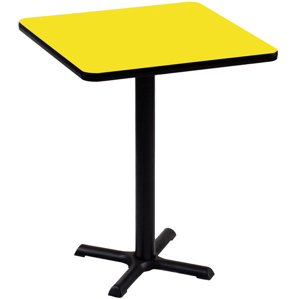 A yellow square Correll table with a black base.