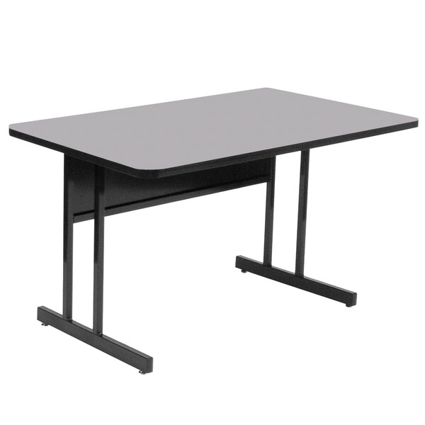 A black rectangular table with black legs and a gray granite top.