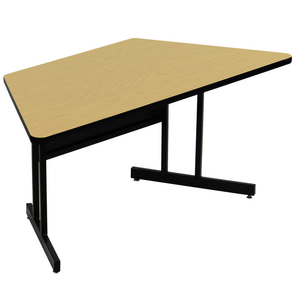 A trapezoid table with black legs and a wooden top.