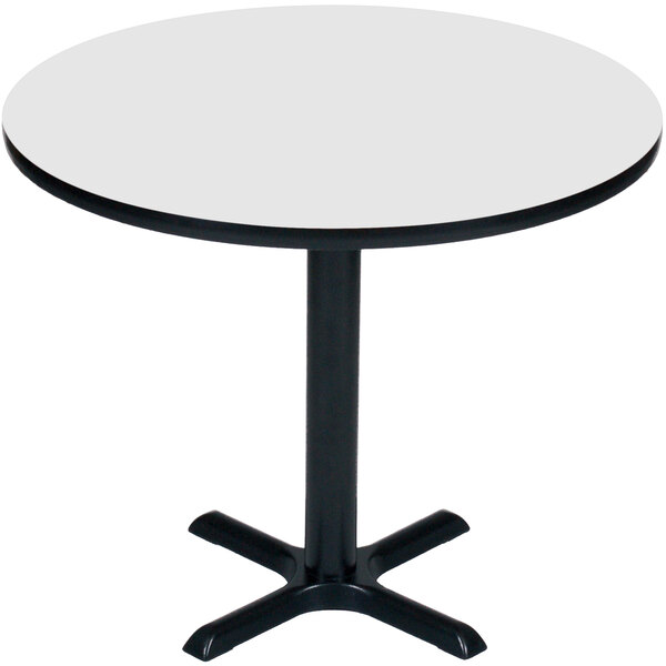 A white Correll bar height table with a black base.