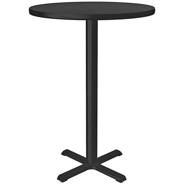 A black Correll bar height table with a metal base.