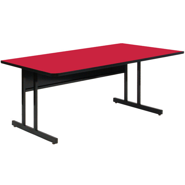 A red rectangular table with black legs.