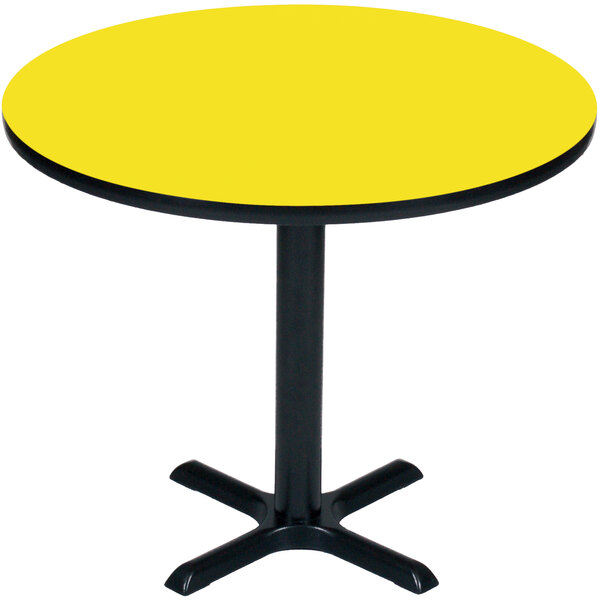 A Correll yellow table with a black bar height base.