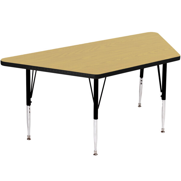 A trapezoid-shaped Correll activity table with black legs.