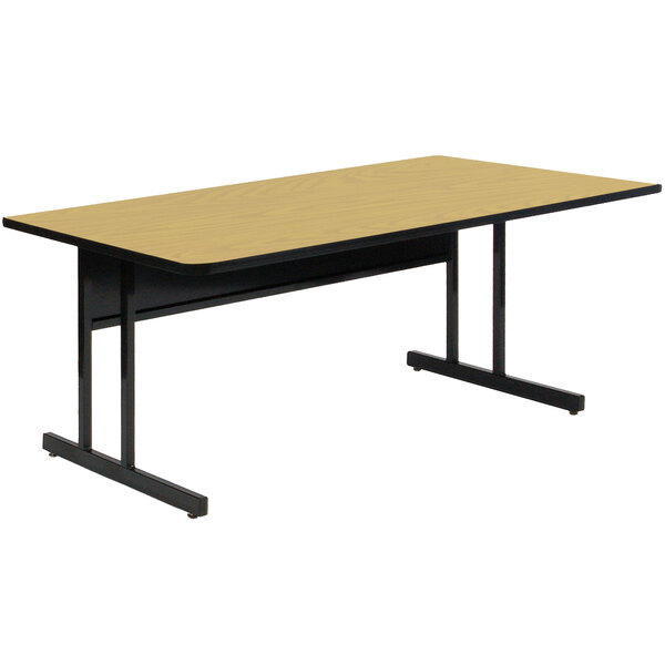 A rectangular Fusion Maple computer table with black legs.