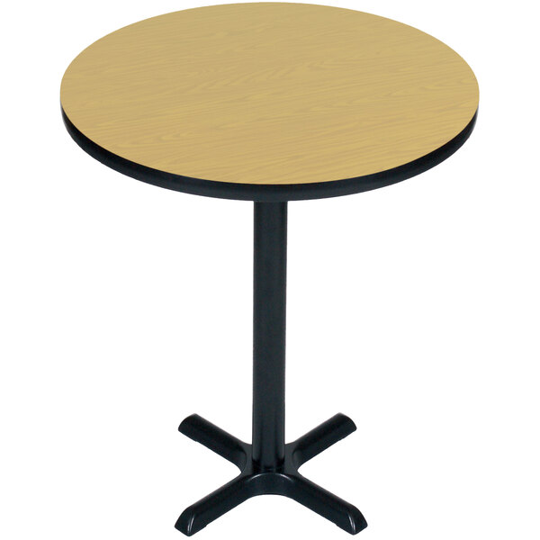 A Correll round table with a black base.