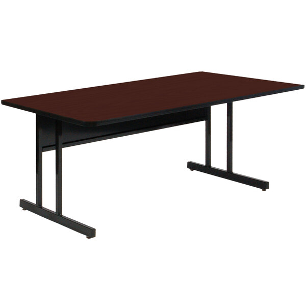 A brown rectangular table with black legs.