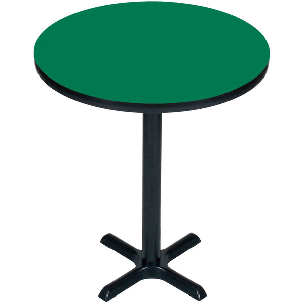 A green Correll bar height table with a black base.