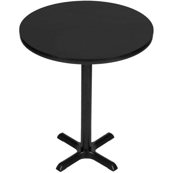 A black round Correll bar height table with a metal base.