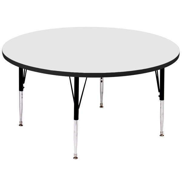 A white Correll round activity table with black legs.
