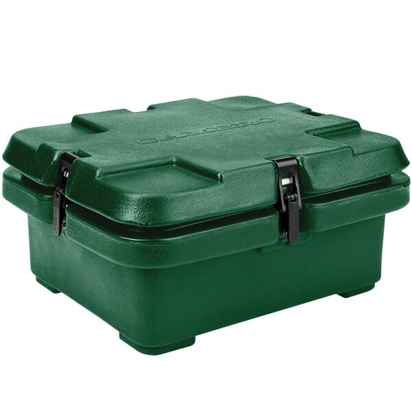 A green plastic box with black handles.