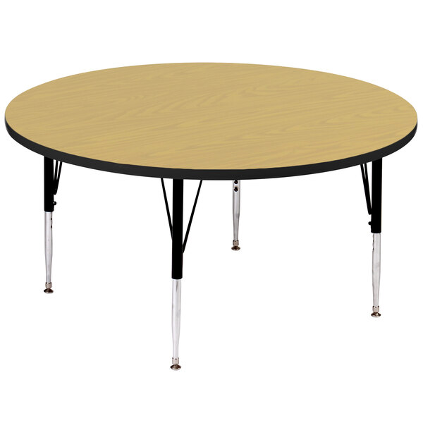 A Correll round activity table with black legs.