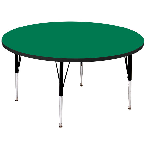 A green Correll round activity table with black legs.