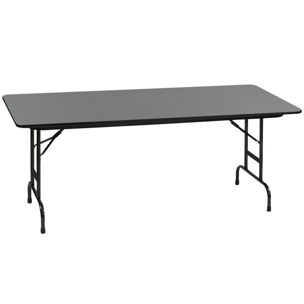 A rectangular black Correll folding table with metal legs.