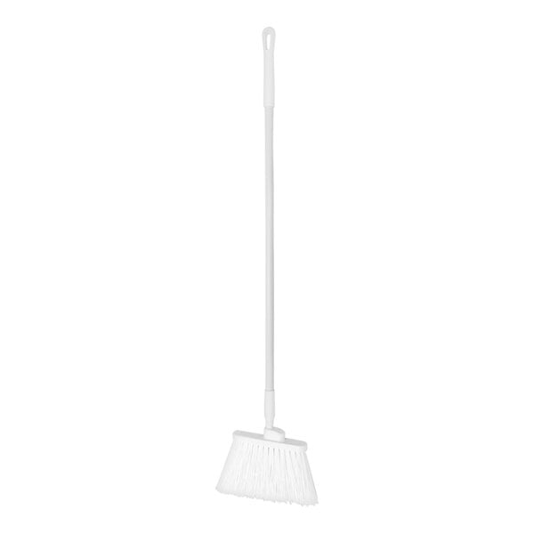 A white broom with a long white handle.