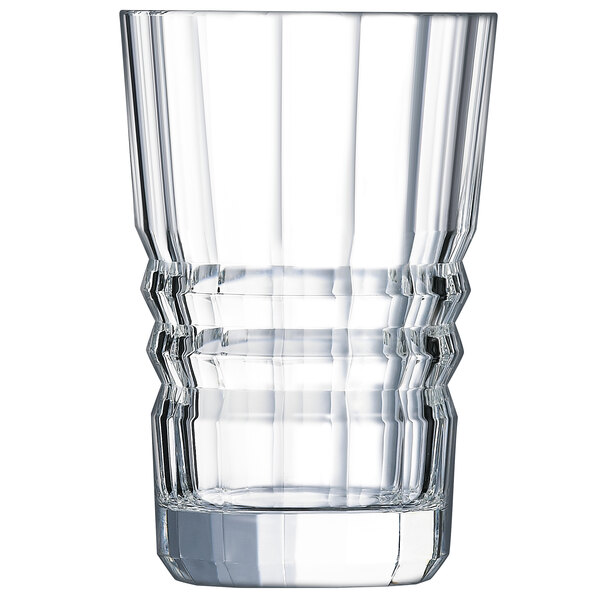 A clear Chef & Sommelier highball glass with a curved design.