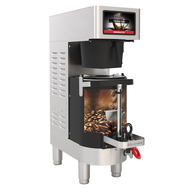 A white Grindmaster PrecisionBrew coffee brewer machine with a glass shuttle inside filled with coffee beans.