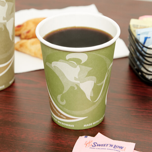 An Eco-Products Evolution World paper hot cup filled with coffee on a table.