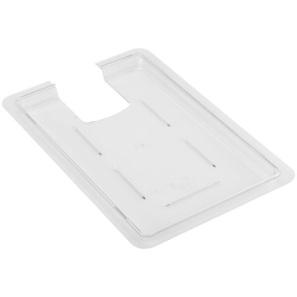 A clear plastic tray with a hole in the middle.