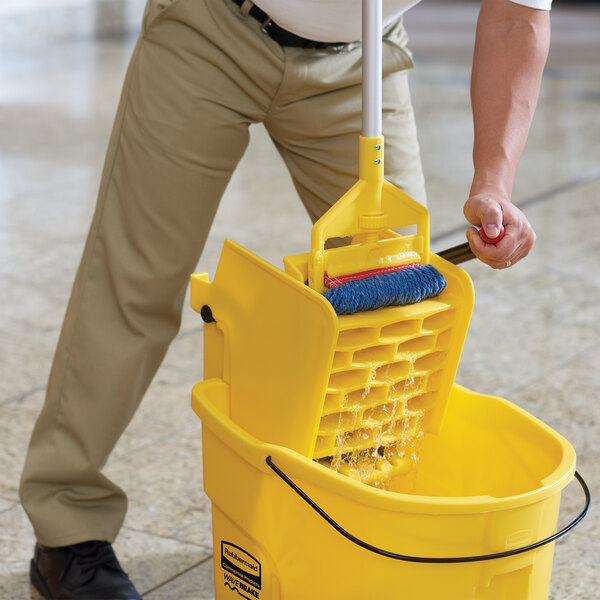 Rubbermaid 2031764 WaveBrake® 35 Qt. Yellow Mop Bucket with Side Press