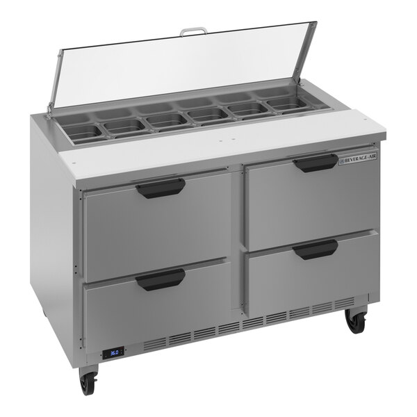 A Beverage-Air refrigerated sandwich prep table with clear lids on the drawers.