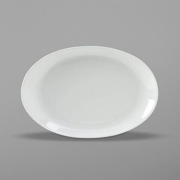 A Tuxton bright white wing platter with a white rim.