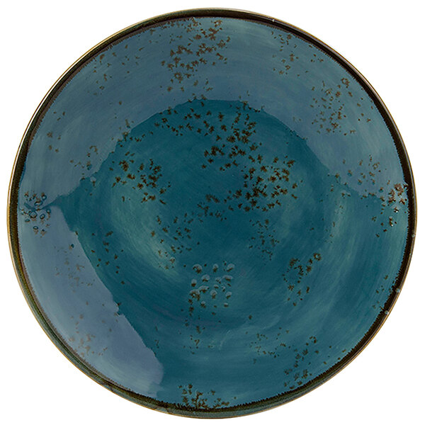 A blue plate with brown specks.