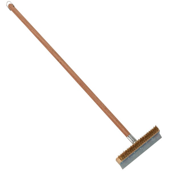 An American Metalcraft pizza oven brush with a long wooden handle and a silver tip.