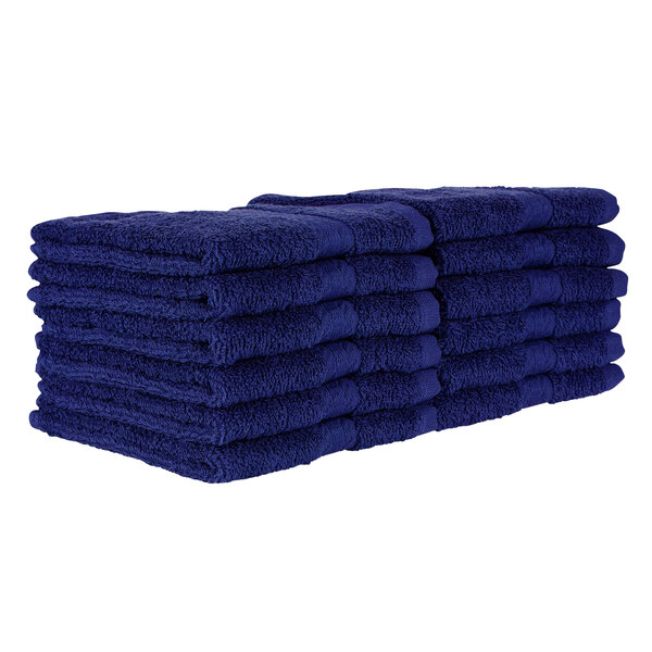 A stack of Monarch Brands navy blue wash cloths.