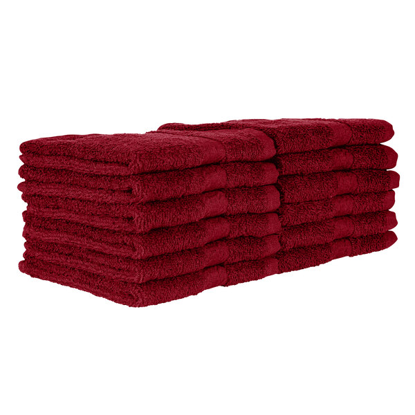 A stack of Monarch Brands burgundy wash cloths.