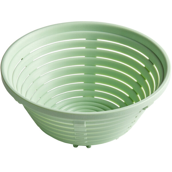 A close up of a green plastic basket with handles.