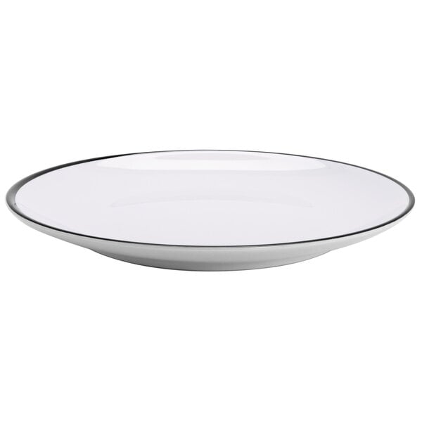 A white GET Settlement bistro melamine dinner plate with a black rim.