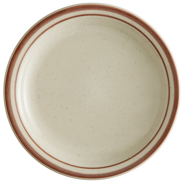 A close-up of a Libbey narrow rim stoneware plate with brown bands on a white background.