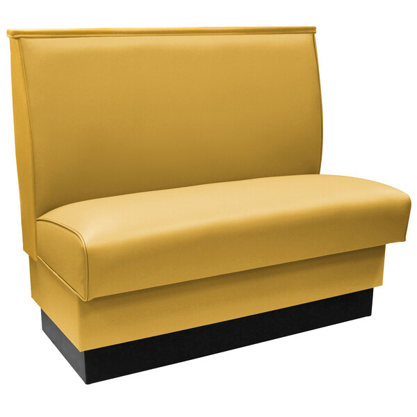 A yellow booth seat with a black base.