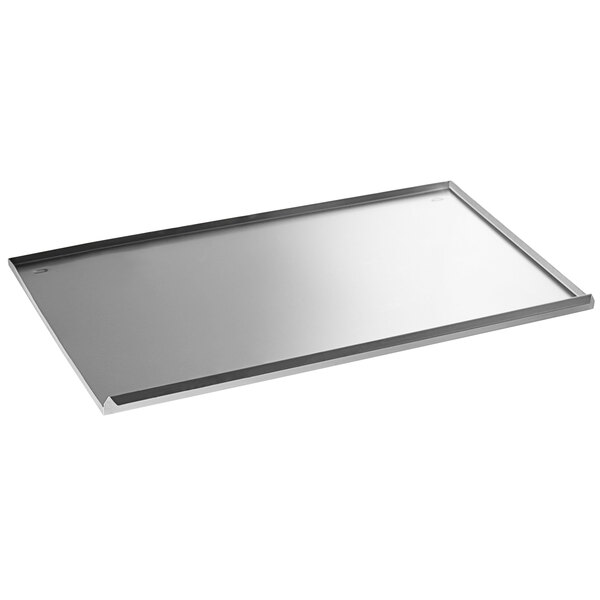 An Avantco stainless steel rectangular drip tray with a white border.