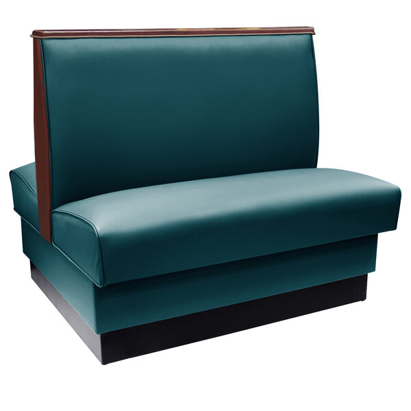 An American Tables & Seating forest green upholstered booth with wood accents.