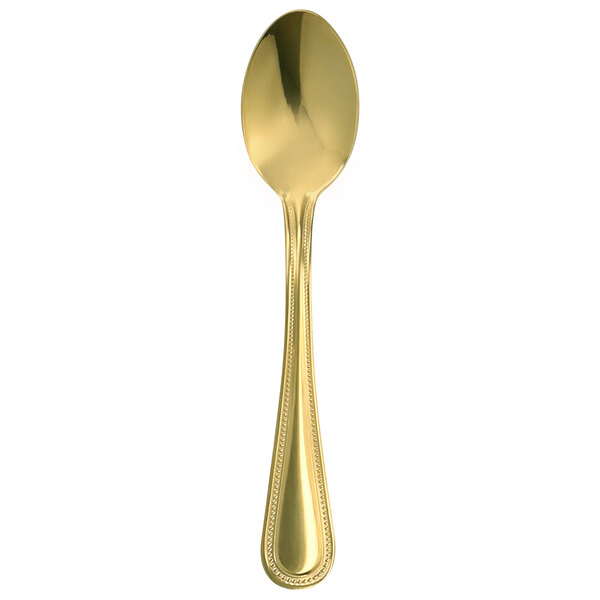 A gold Walco dessert spoon with a rectangular handle.