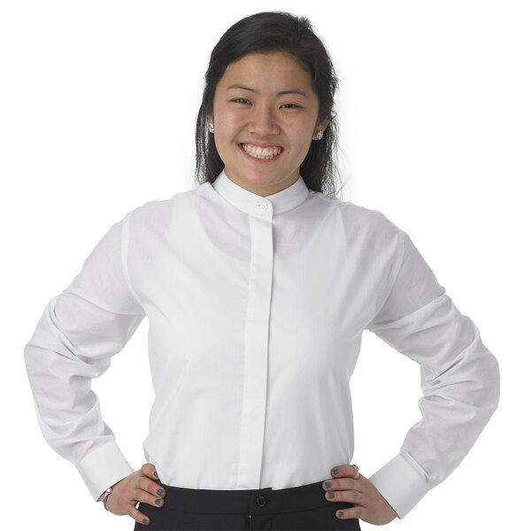 A woman wearing a white Henry Segal band collar dress shirt.