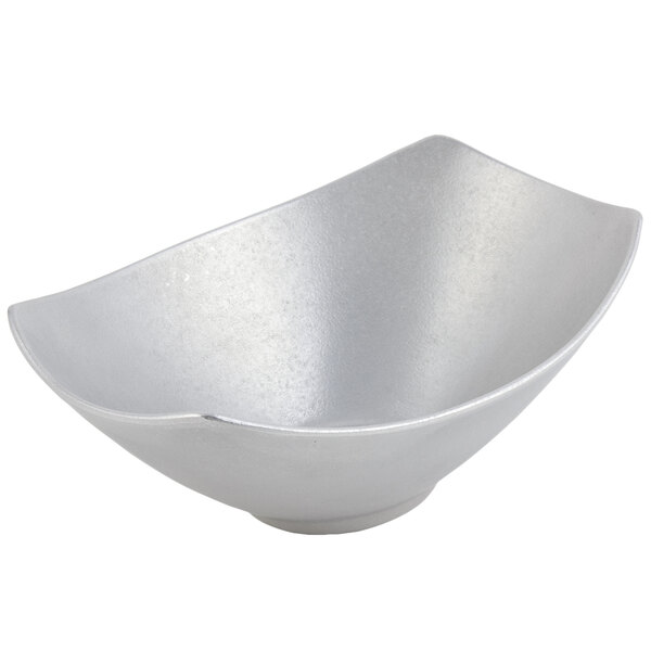A Bon Chef pewter-glo serving bowl with a curved edge.