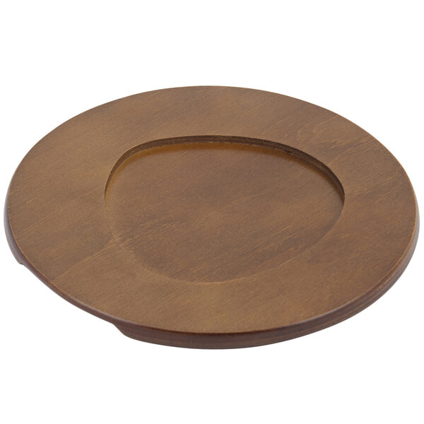 A round wooden underliner with a circular hole in the middle.