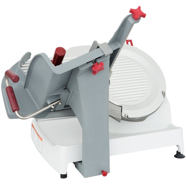 A grey and red Berkel meat slicer with a circular blade and red handle.